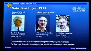 A screen showing pictures of the winners of the 2016 Nobel Prize for Physics during a news conference by the Royal Swedish Academy of Sciences in Stockholm, Sweden October 4, 2016. From left: David Thouless, Duncan Haldane and Michael Kosterlitz.   TT News Agency/Anders Wiklund/via REUTERS